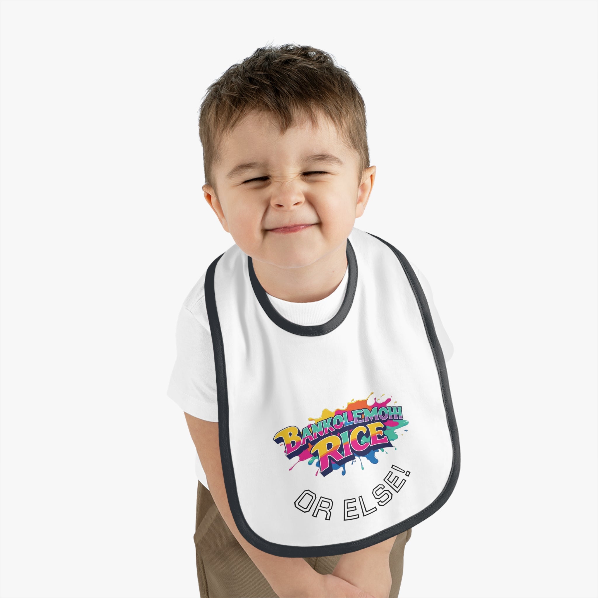 Bankolemoh rice or else, Baby Contrast Trim Jersey Bib - Naija Of Course with a black rim around it.